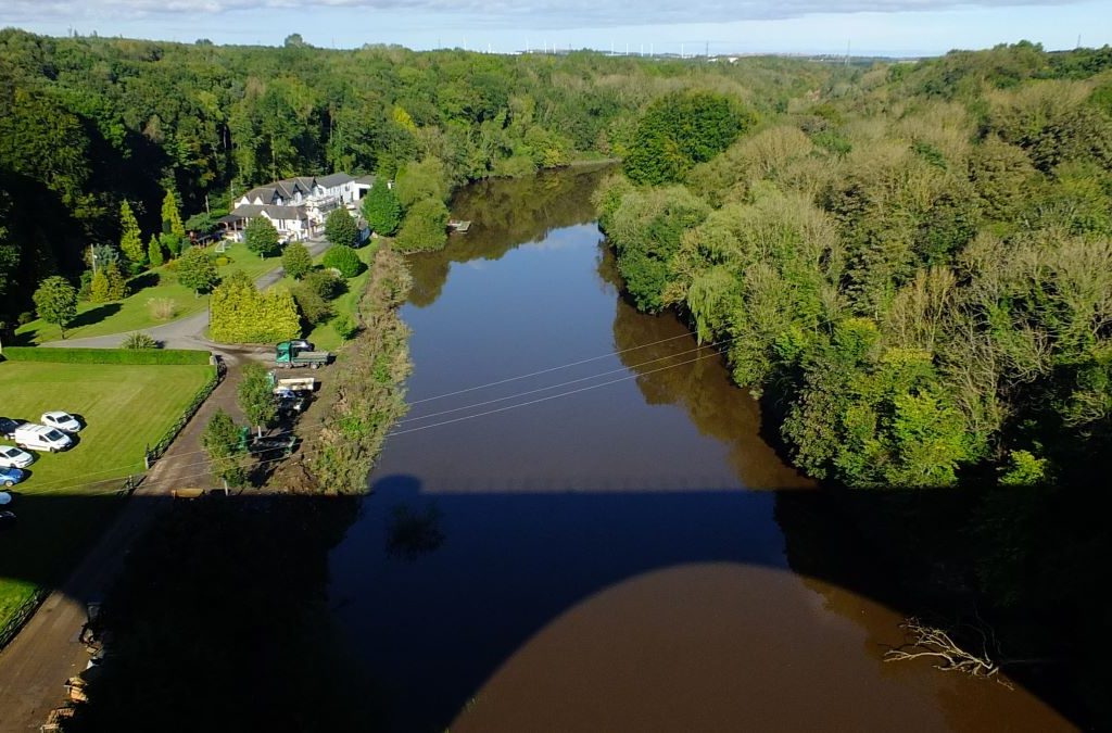 Image of the River Wear with the shadow of the Victoria Viaduct showing across the water